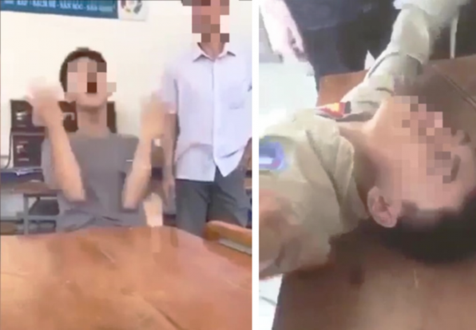 Hai nam sinh có biểu hiện ngáo đá ngay trong lớp sau khi sử dụng thuốc lá điện tử. Ảnh cắt từ clip.