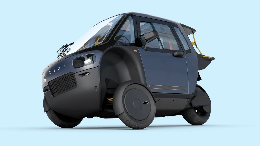 Chiếc xe điện ba bánh với bàn đạp có thể chạy tới 120km/h, mui kín như ô tô - 2 Chiếc xe điện ba bánh với bàn đạp có thể chạy tới 120km/h, mui kín như ô tô - 2