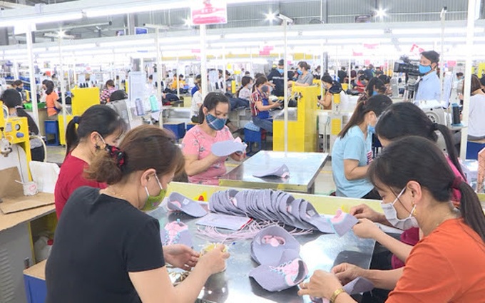 Doanh nghiệp lao đao sau 2 lần bùng dịch covid -19 - Ảnh 1. Doanh nghiệp lao đao sau 2 lần bùng dịch covid -19 - Ảnh 1.