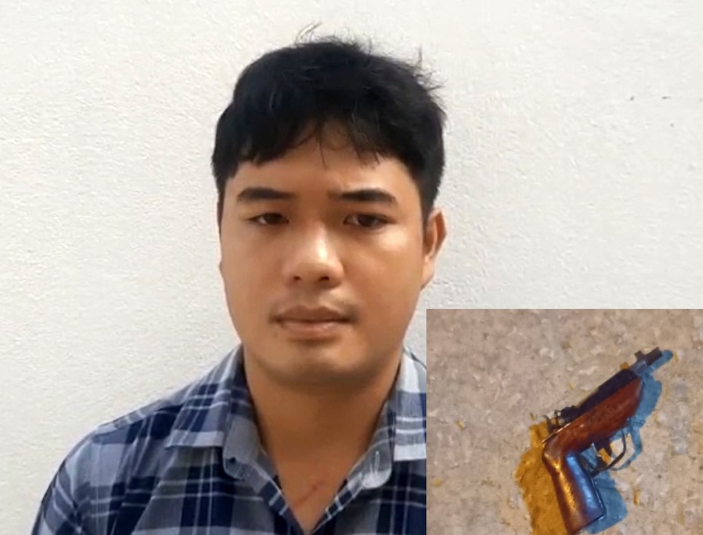 Tên cướp có súng sa lưới sau 30 phút gây án - 1 Tên cướp có súng sa lưới sau 30 phút gây án - 1