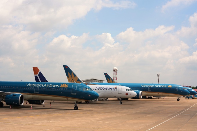 Vietnam Airlines và Pacific Airlines áp dụng bộ điều kiện nhóm giá mới với nhiều thay đổi cho hạng Phổ thông - Ảnh 1.