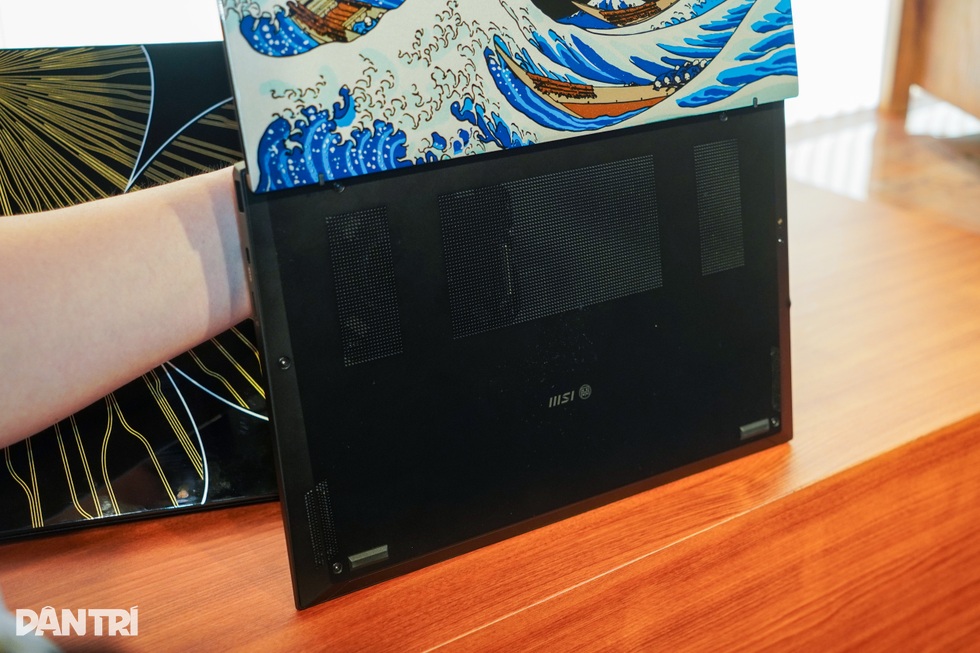 Computex 2025: Laptop AI có mặt lưng tranh sơn mài thủ công - 5 Computex 2025: Laptop AI có mặt lưng tranh sơn mài thủ công - 5