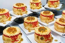 Chưa tới ngày vía Thần Tài, bánh hũ vàng "cháy hàng" chợ mạng