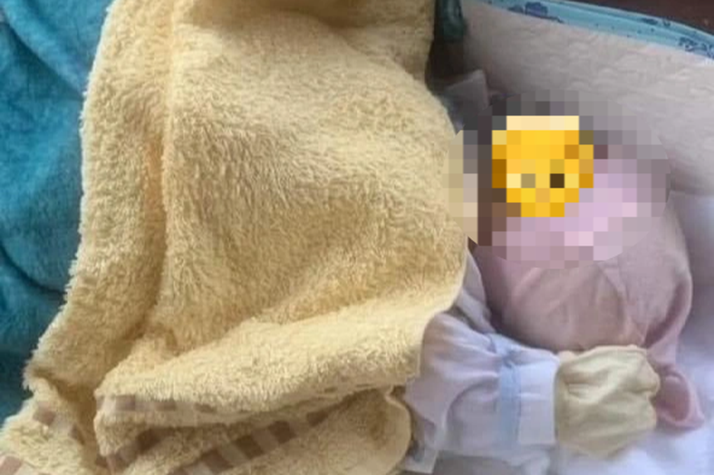 Bé gái sơ sinh còn nguyên dây rốn bị bỏ bên đường - 1 Bé gái sơ sinh còn nguyên dây rốn bị bỏ bên đường - 1