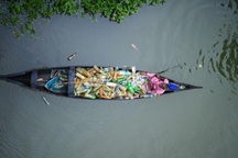 Cụ ông bị liệt 2 chân, 15 năm nhặt rác và bức ảnh thay đổi cuộc đời mãi mãi