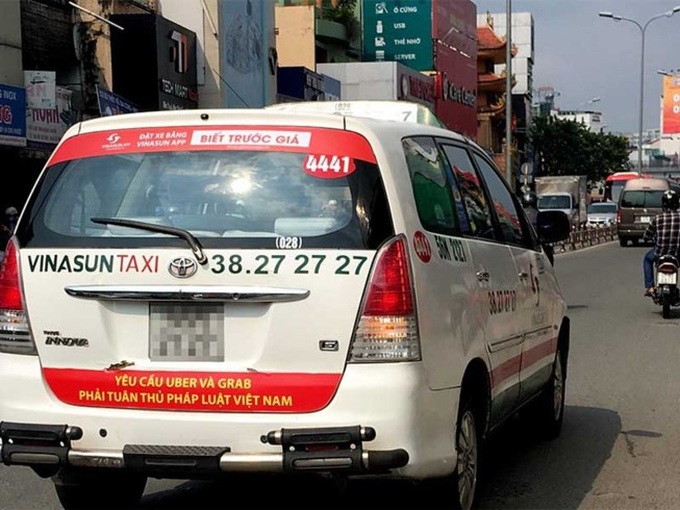 Bộ GTVT: Grab, Uber không phải là… taxi - ảnh 1