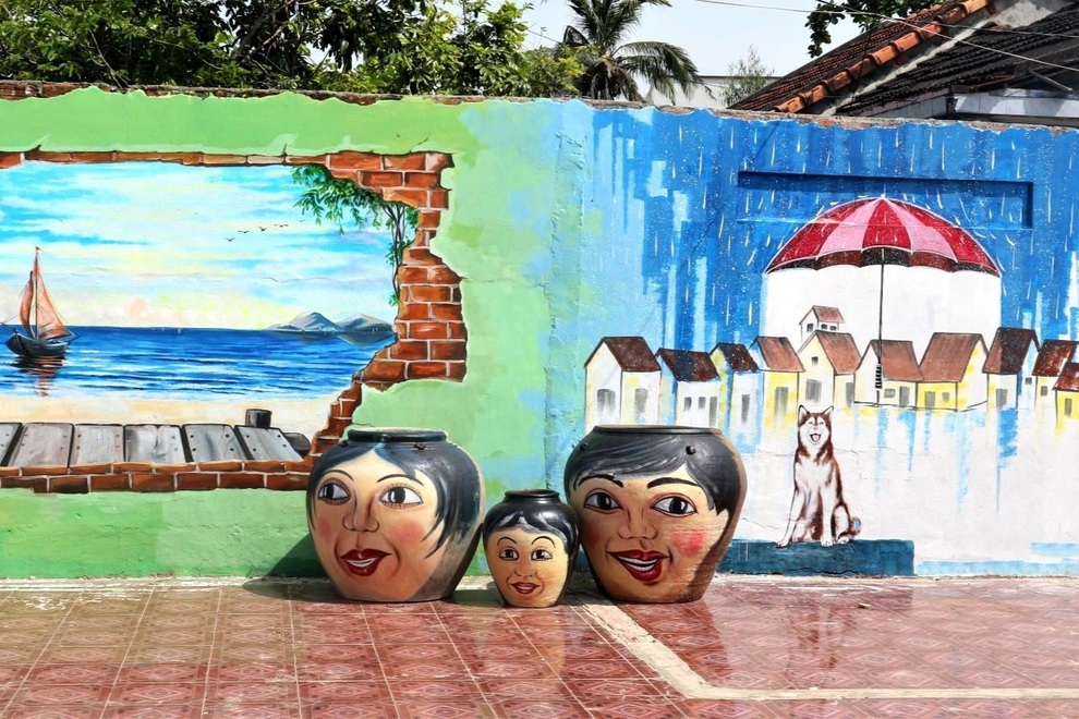Làng bích họa đầu tiên ở Việt Nam được khoác thêm áo mới - 9 Làng bích họa đầu tiên ở Việt Nam được khoác thêm áo mới - 9
