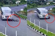 Clip: Người đi xe máy thoát chết thần kỳ sau khi ngã vào gầm xe bus