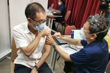 Tăng 1.650 ca Covid-19, Singapore tái áp dụng các lệnh hạn chế