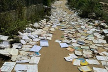 Phía sau video cảnh sách vở học sinh phơi đầy đường cho khô ở Yên Bái