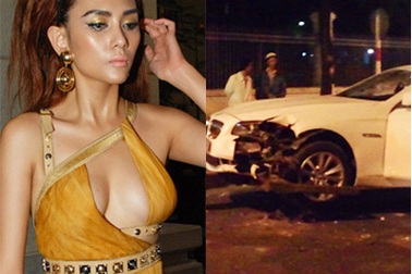 Xe chở siêu mẫu Võ Hoàng Yến lật ngửa giữa phố Sài Gòn