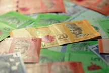 Kẹt xe, đi mua vé số, bất ngờ trúng độc đắc