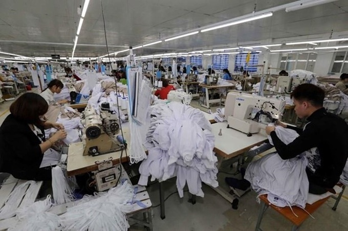 Doanh nghiệp dệt may Việt Nam nỗ lực thích ứng với hội nhập - Ảnh 1. Doanh nghiệp dệt may Việt Nam nỗ lực thích ứng với hội nhập - Ảnh 1.