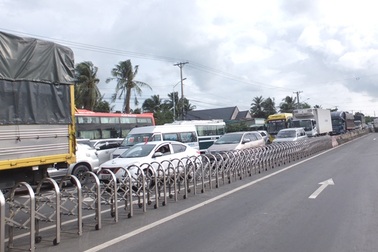 Xả trạm thu phí Cai Lậy vì tài xế đồng loạt trả tiền lẻ