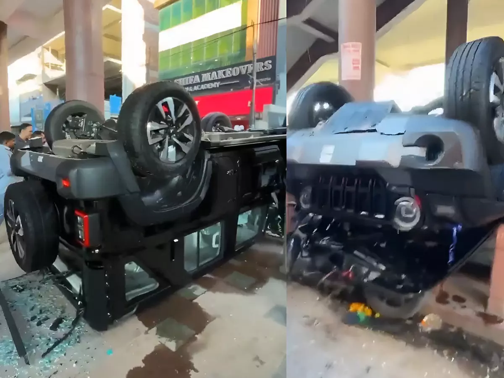 Vừa sắm ô tô mới, cô gái lao xe từ tầng 1 xuống đất vì đạp nhầm chân ga - 1 Vừa sắm ô tô mới, cô gái lao xe từ tầng 1 xuống đất vì đạp nhầm chân ga - 1