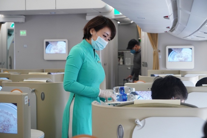 Vietnam Airlines tăng cường giải pháp đảm bảo an toàn sức khỏe hành khách - Ảnh 1.