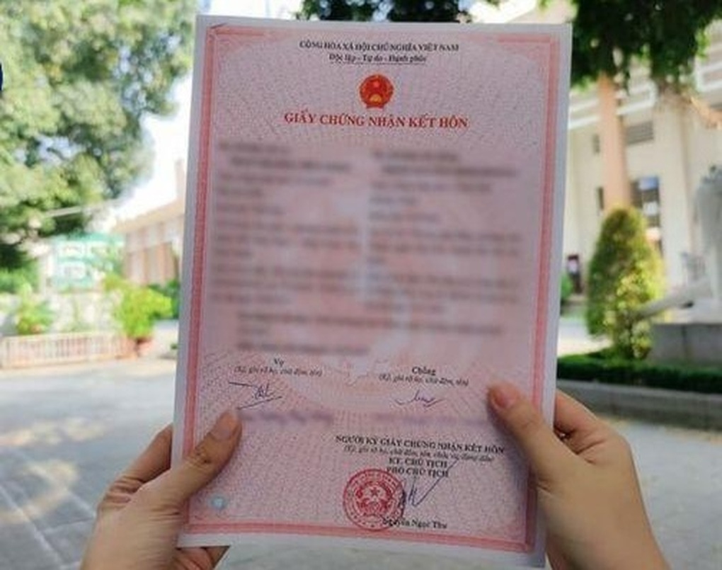 Không cần giấy xác nhận tình trạng hôn nhân khi đăng ký kết hôn - 1