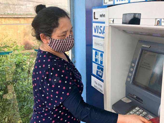 Hà Nội: Giải quyết chi trả lương hưu và BHXH qua tài khoản cá nhân ATM - Ảnh 1.