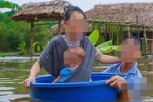 Thực hư bức ảnh chồng dùng chậu đưa vợ con sơ tán lũ ở Hà Giang
