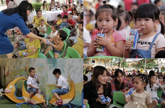 Các bé Trường Mầm non Cao Thành háo hức đón nhận những hộp sữa trong Ngày hội đến trường.