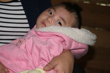 Thương bé 1 tuổi mang bệnh não úng thủy