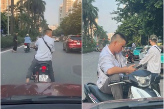 Hà Nội: Đỗ xe máy chặn đầu ô tô để đòi tiền đỗ xe?