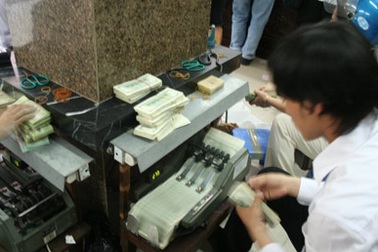 Không điều chỉnh biên độ tỷ giá VND/USD