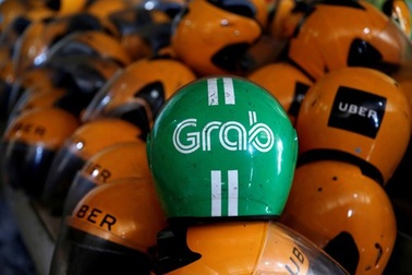 Vụ Grab thâu tóm Uber: Doanh nghiệp đối mặt án phạt 10% doanh thu nếu vi phạm