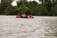Người dân ngỡ ngàng trước trận mưa lụt "lạ đời chưa từng thấy"