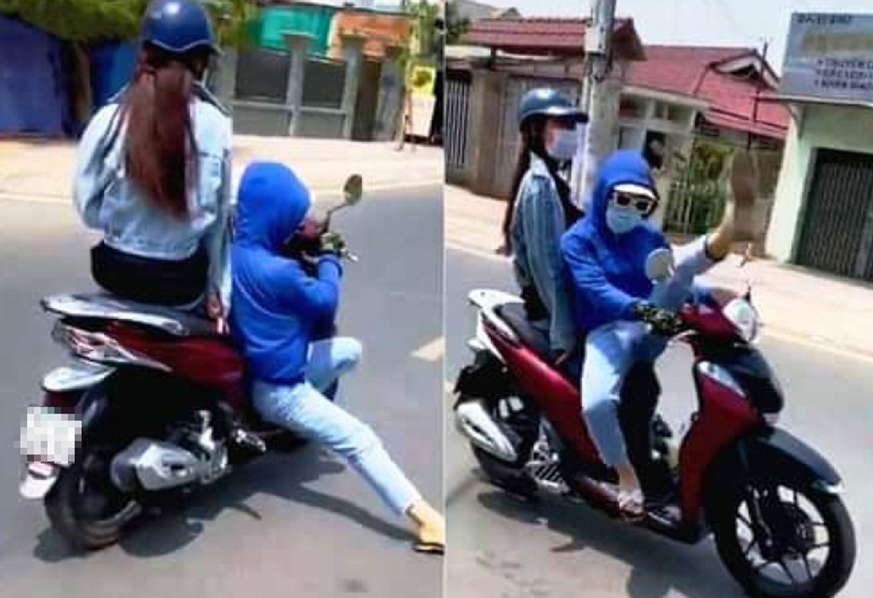 Triệu tập thanh niên làm xiếc khi lái xe máy trên đường - 1