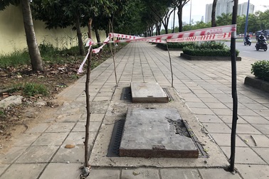 Khắc phục tạm những hố ga bị mất nắp trên đại lộ đẹp nhất Sài Gòn
