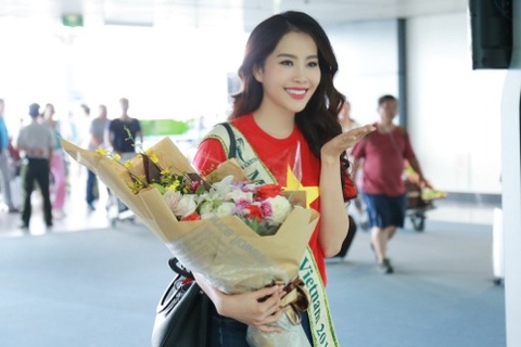 Nam Em mặc trang phục quốc kỳ lên đường tham gia Miss Earth 2016
