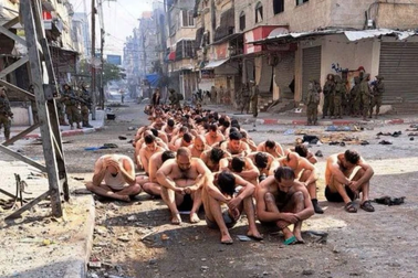 Israel bắt tù nhân Palestine lột trần giữa phố, vấp phản ứng gay gắt