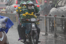 Đặt Grab ngày Tết, khách trả thêm phụ phí 5.000-15.000 đồng