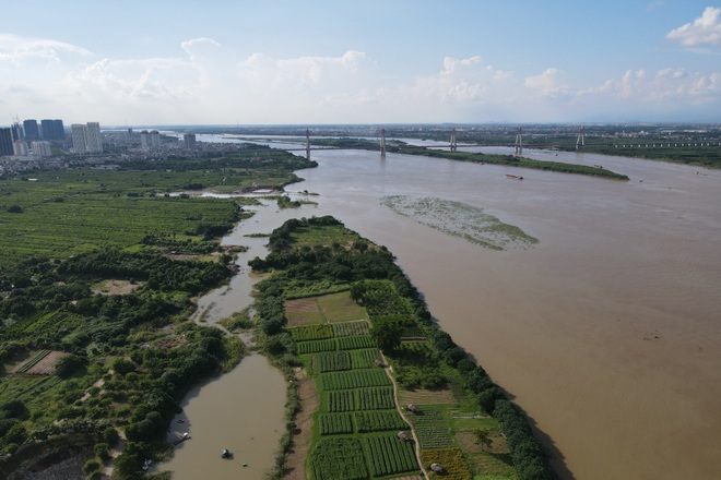 Cảnh hồ thủy điện xả lũ lớn, nước cuộn sóng nhấn chìm bãi giữa sông Hồng - 15 Cảnh hồ thủy điện xả lũ lớn, nước cuộn sóng nhấn chìm bãi giữa sông Hồng - 15