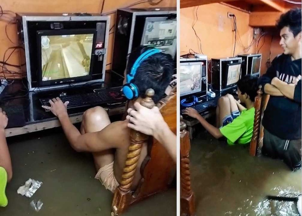Bật cười hình ảnh các game thủ thản nhiên ngồi cày dù nước lụt bao quanh - 2 Bật cười hình ảnh các game thủ thản nhiên ngồi cày dù nước lụt bao quanh - 2
