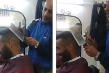 Rợn người xem thợ dùng búa và dao chặt xương để... cắt tóc