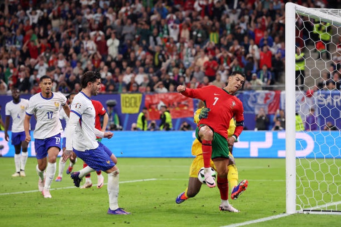 hamburg-germany-cristiano-ronaldo-of-portugal-tries-to-controls-the-ball-but-is-challenged-by.jpg