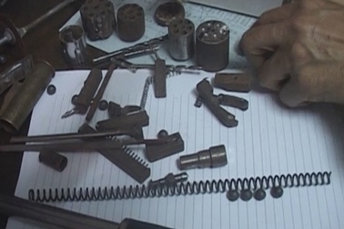 Bắt đối tượng mua bán ma tuý "lòi" ổ súng đạn