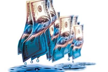 Chia nhỏ giao dịch giá trị lớn sẽ thoát “án” rửa tiền