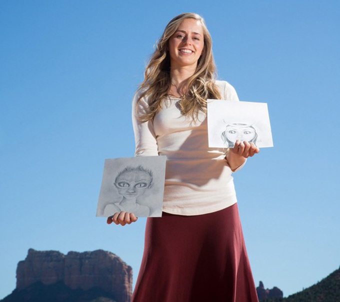 Bridget Nielson giơ ảnh vẽ phác hai trong số 10 đứa con cô sinh với người ngoài hành tinh. Ảnh: Solent