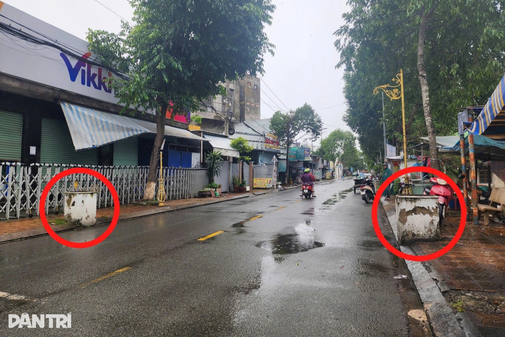 Mưa dông làm sập cổng chào, đổ cây xanh, tốc mái nhà dân - 1 Mưa dông làm sập cổng chào, đổ cây xanh, tốc mái nhà dân - 1