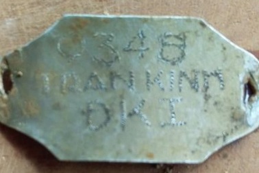 Hài cốt liệt sĩ được chôn kèm tấm nhôm khắc tên