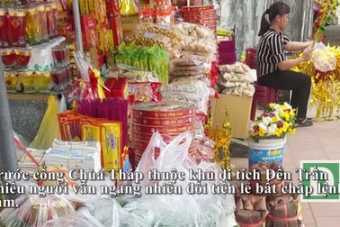 Dịch vụ đổi tiền lẻ chèo kéo khách phớt lờ quy định