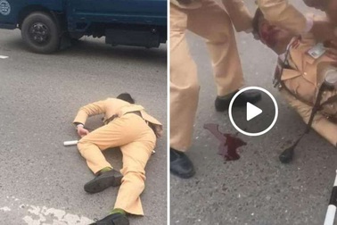 Hà Nội: Đôi nam nữ vượt đèn đỏ, tông gục cảnh sát giao thông