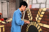 Chưa tốt nghiệp, nam sinh trường nghề "ẵm" giải nhất quốc gia nghề xây gạch