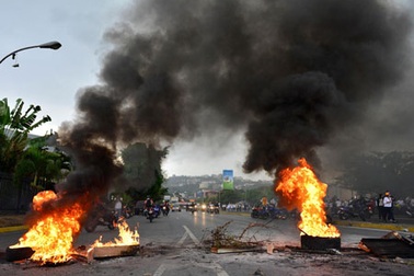  Thủ đô Venezuela tê liệt sau vụ thủ lĩnh đối lập bị bắt 