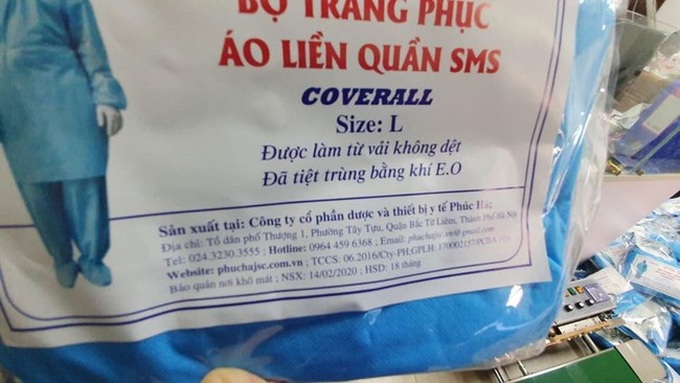 Khởi tố bắt giam thêm 1 nhân viên bệnh viện trong vụ buôn bán trang phục phòng dịch giả - Ảnh 1.