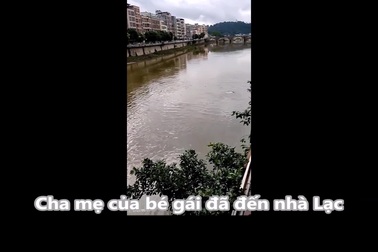 Người hùng nhảy xuống sông để cứu bé gái đang bị nước cuốn trôi