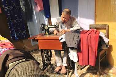 NTK trang phục Táo Quân đi chân đất kể chuyện Tết bao cấp